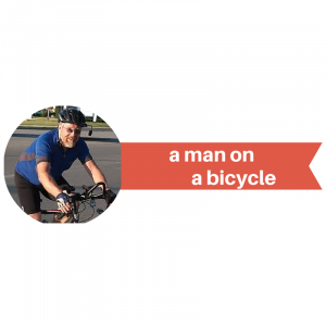 a man on         a bicycle